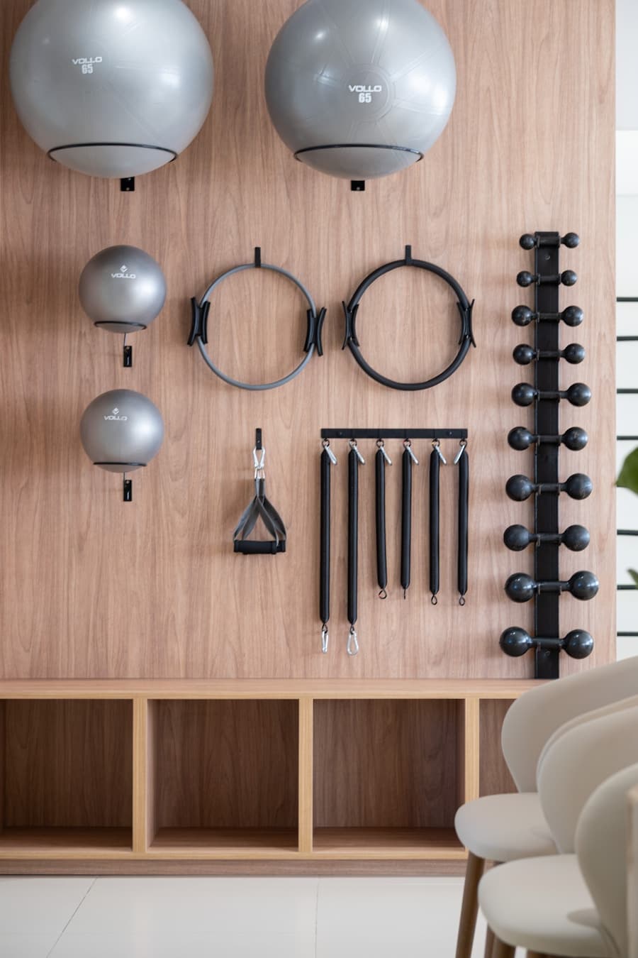 Pilates equipment on wooden wall